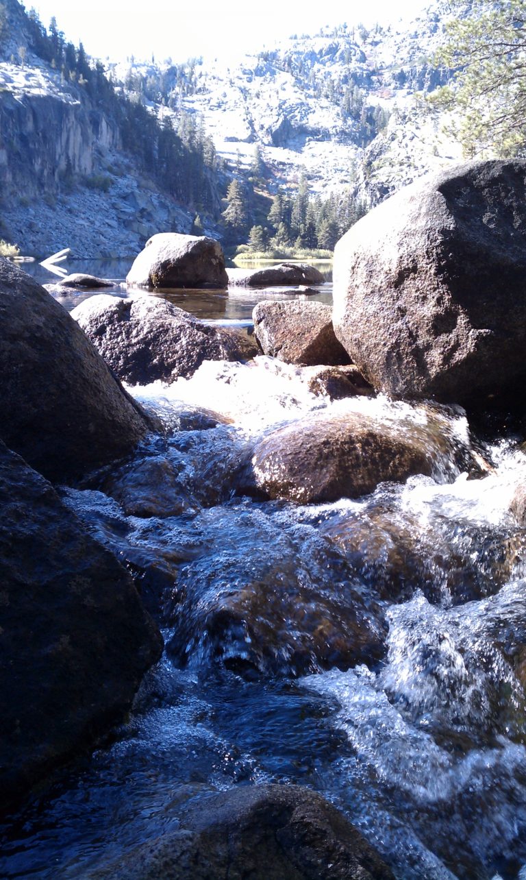 water flowing through rocky stream